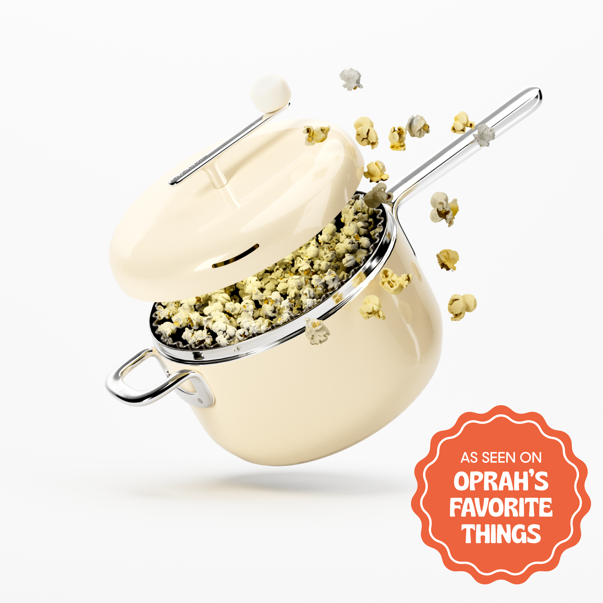 Cream-colored popcorn maker with popping popcorn, featuring 'Oprah's Favorite Things' label.
